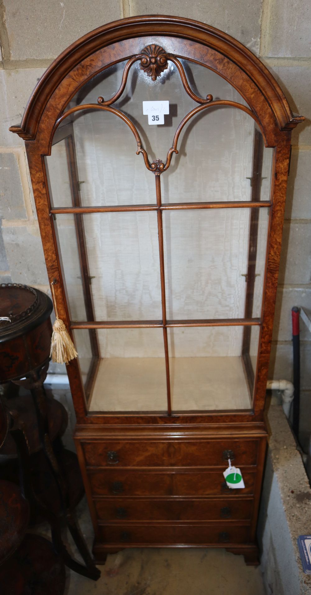 A Queen Anne-style walnut narrow display cabinet, W.58cm, D.34cm, H.166cm